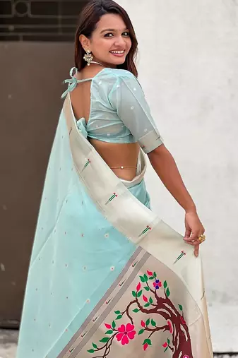 Sky blue woven self design organza paithani saree with blouse