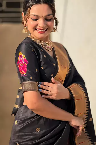 Black woven self design pure silk paithani saree with blouse