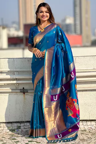 Blue woven self design pure silk paithani saree with blouse