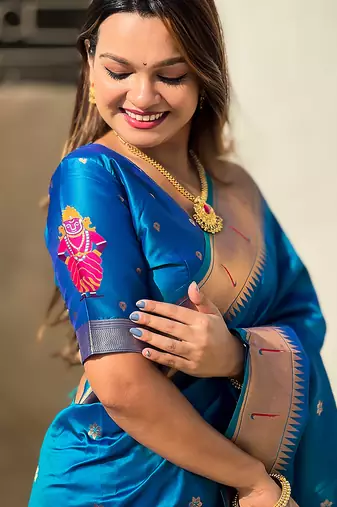 Blue woven self design pure silk paithani saree with blouse