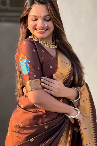 Brown woven self design pure silk paithani saree with blouse