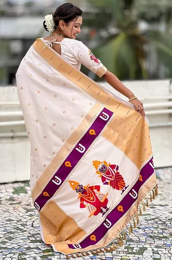 Cream woven self design pure silk paithani saree with blouse