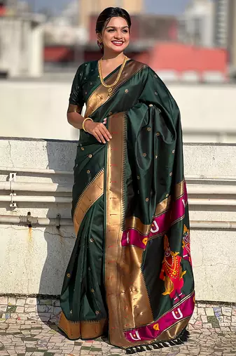 Dark green woven self design pure silk paithani saree with blouse