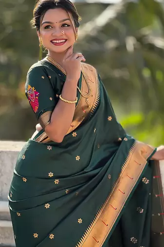 Dark green woven self design pure silk paithani saree with blouse