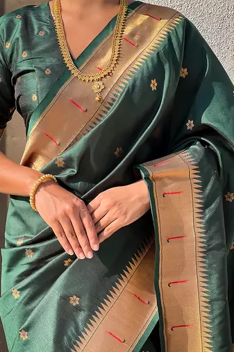 Dark green woven self design pure silk paithani saree with blouse