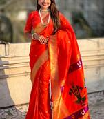 Orange woven self design pure silk paithani saree with blouse