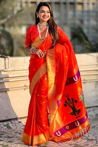 Orange woven self design pure silk paithani saree with blouse