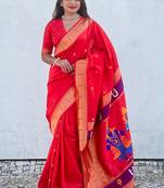 Red woven self design pure silk paithani saree with blouse