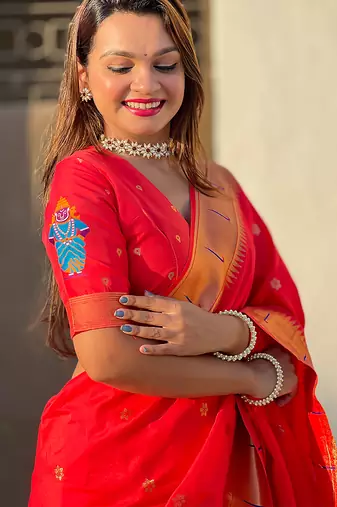 Red woven self design pure silk paithani saree with blouse