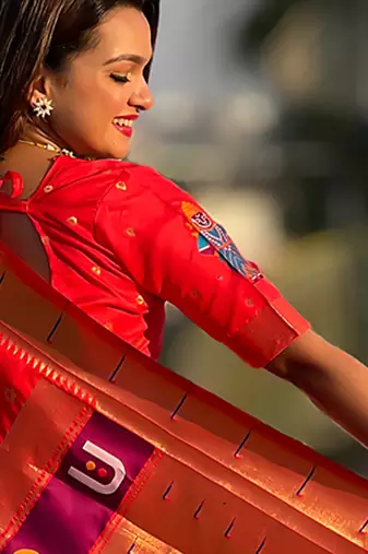 Red woven self design pure silk paithani saree with blouse