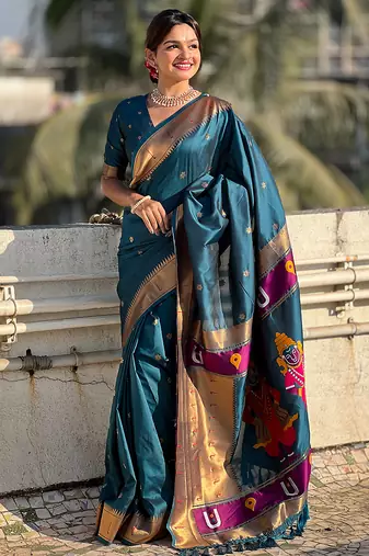Teal blue woven self design pure silk paithani saree with blouse