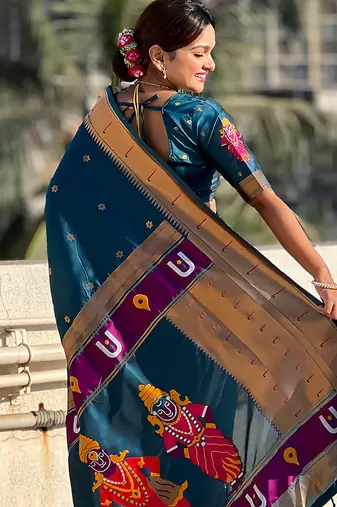 Teal blue woven self design pure silk paithani saree with blouse