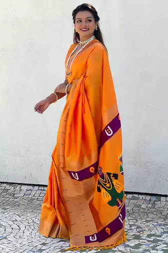 Yellow woven self design pure silk paithani saree with blouse
