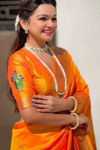 Yellow woven self design pure silk paithani saree with blouse