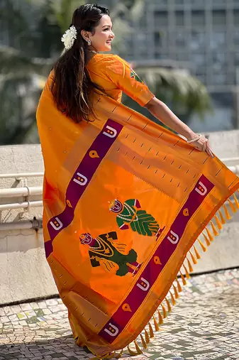 Yellow woven self design pure silk paithani saree with blouse