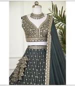 Green Star Faux Georgette Sequins & Zari Embroidered Lehenga Choli