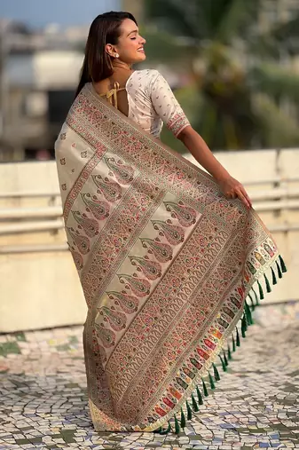 Cream woven self design pashmina silk saree with blouse