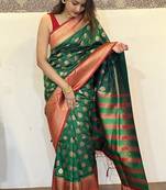 Green woven self design silk blend paithani saree with blouse
