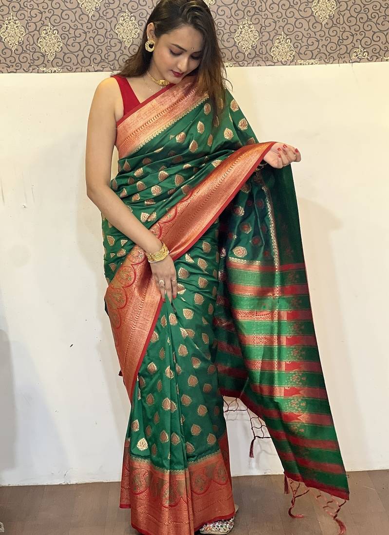 Green woven self design silk blend paithani saree with blouse