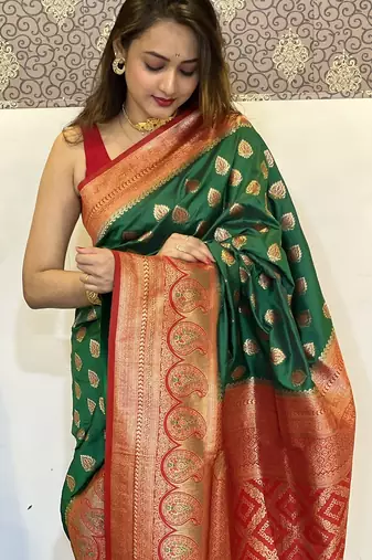 Green woven self design silk blend paithani saree with blouse
