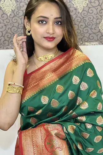 Green woven self design silk blend paithani saree with blouse