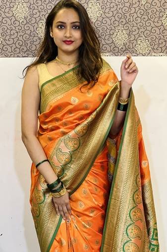 Orange woven self design silk blend paithani saree with blouse