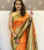 Orange woven self design silk blend paithani saree with blouse