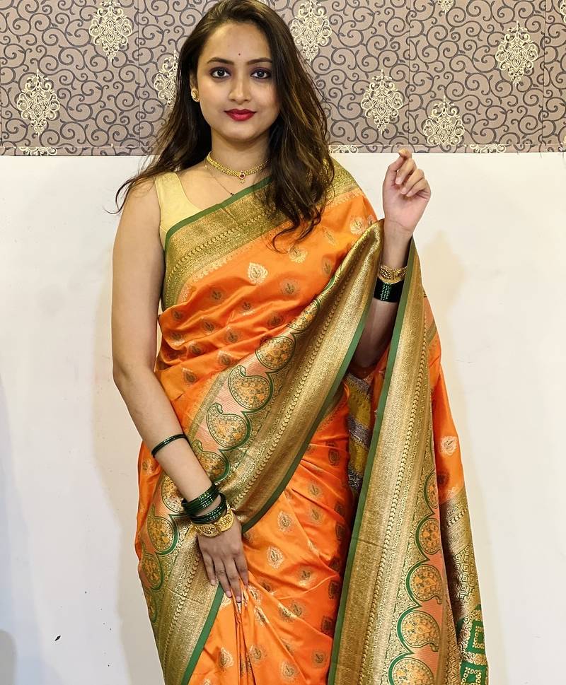 Orange woven self design silk blend paithani saree with blouse