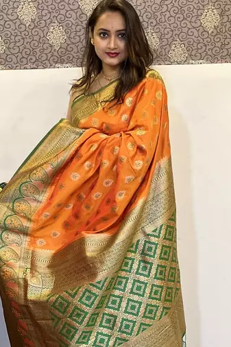 Orange woven self design silk blend paithani saree with blouse