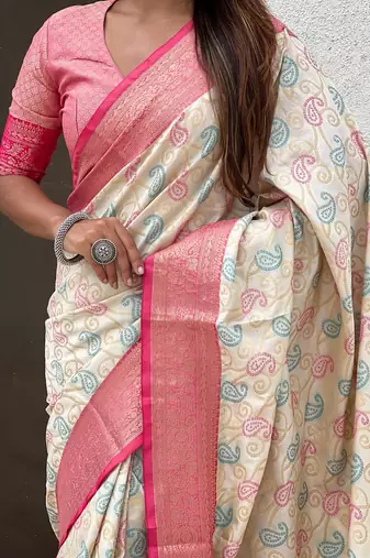Cream woven self design silk blend patola saree with blouse