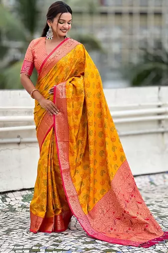Mustard woven self design silk blend patola saree with blouse
