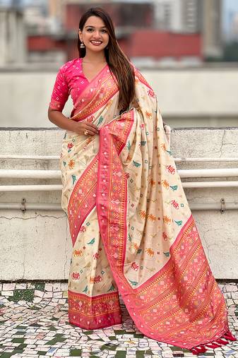 Cream woven self design silk blend patola saree with blouse
