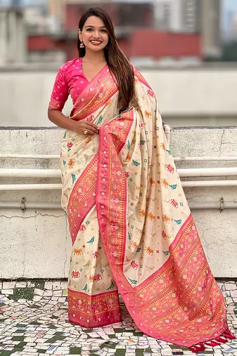 Cream woven self design silk blend patola saree with blouse