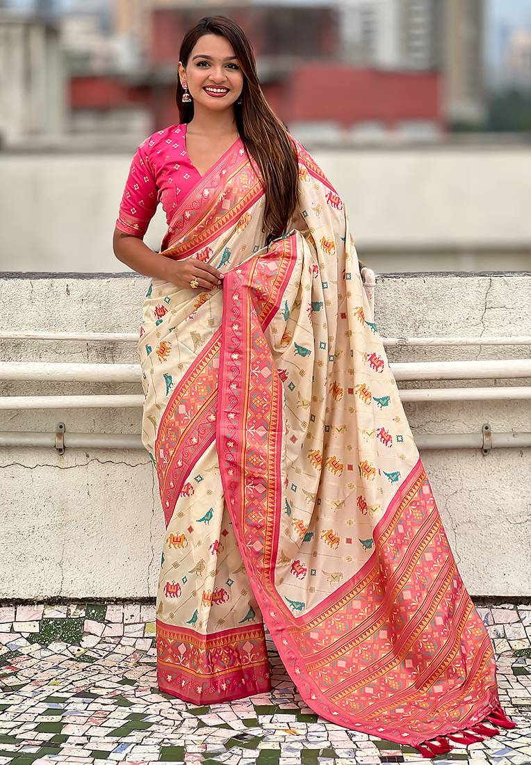 Cream woven self design silk blend patola saree with blouse