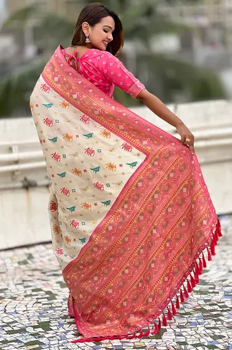 Cream woven self design silk blend patola saree with blouse