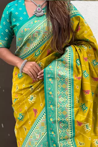 Mehendi woven self design silk blend patola saree with blouse