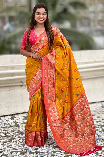 Mustard woven self design silk blend patola saree with blouse
