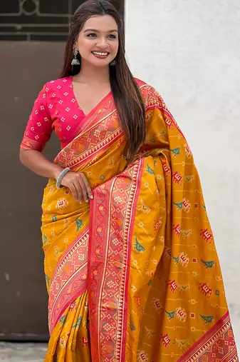 Mustard woven self design silk blend patola saree with blouse
