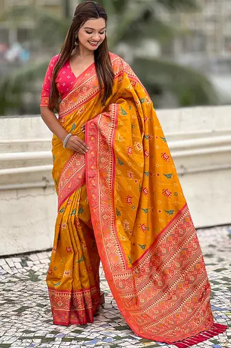 Mustard woven self design silk blend patola saree with blouse