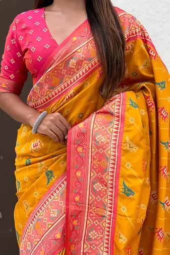 Mustard woven self design silk blend patola saree with blouse