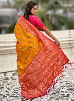 Mustard woven self design silk blend patola saree with blouse 5