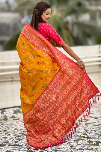 Mustard woven self design silk blend patola saree with blouse