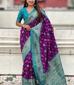 Purple woven self design silk blend patola saree with blouse