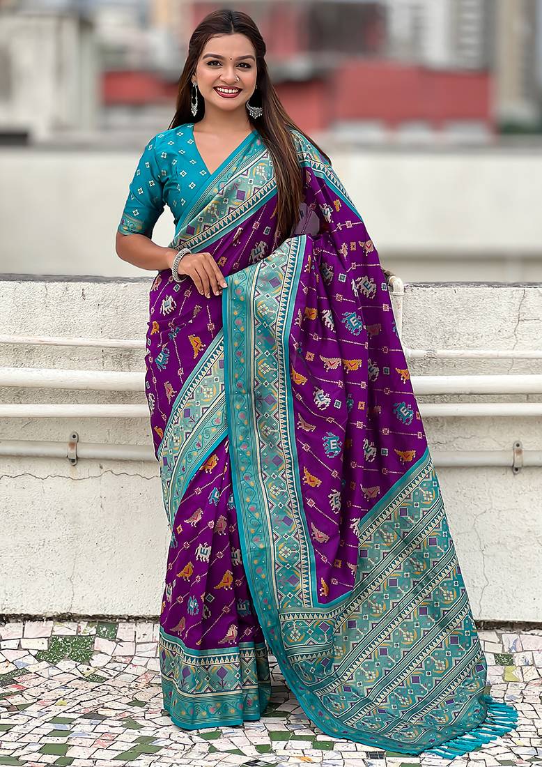 Purple woven self design silk blend patola saree with blouse