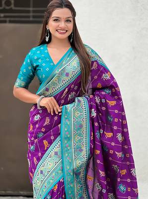 Purple woven self design silk blend patola saree with blouse 2