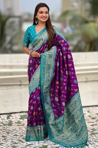 Purple woven self design silk blend patola saree with blouse