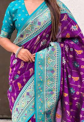 Purple woven self design silk blend patola saree with blouse 4