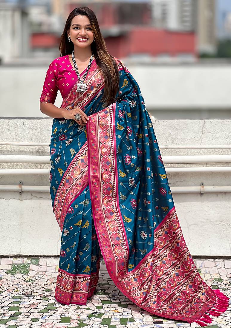 Teal blue woven self design silk blend patola saree with blouse