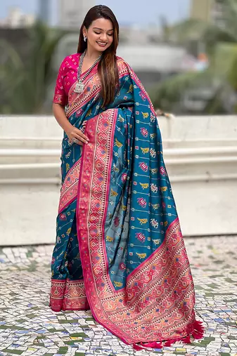 Teal blue woven self design silk blend patola saree with blouse