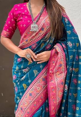 Teal blue woven self design silk blend patola saree with blouse 4